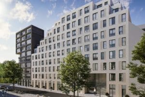 Modern appartementengebouw met bomen op de voorgrond